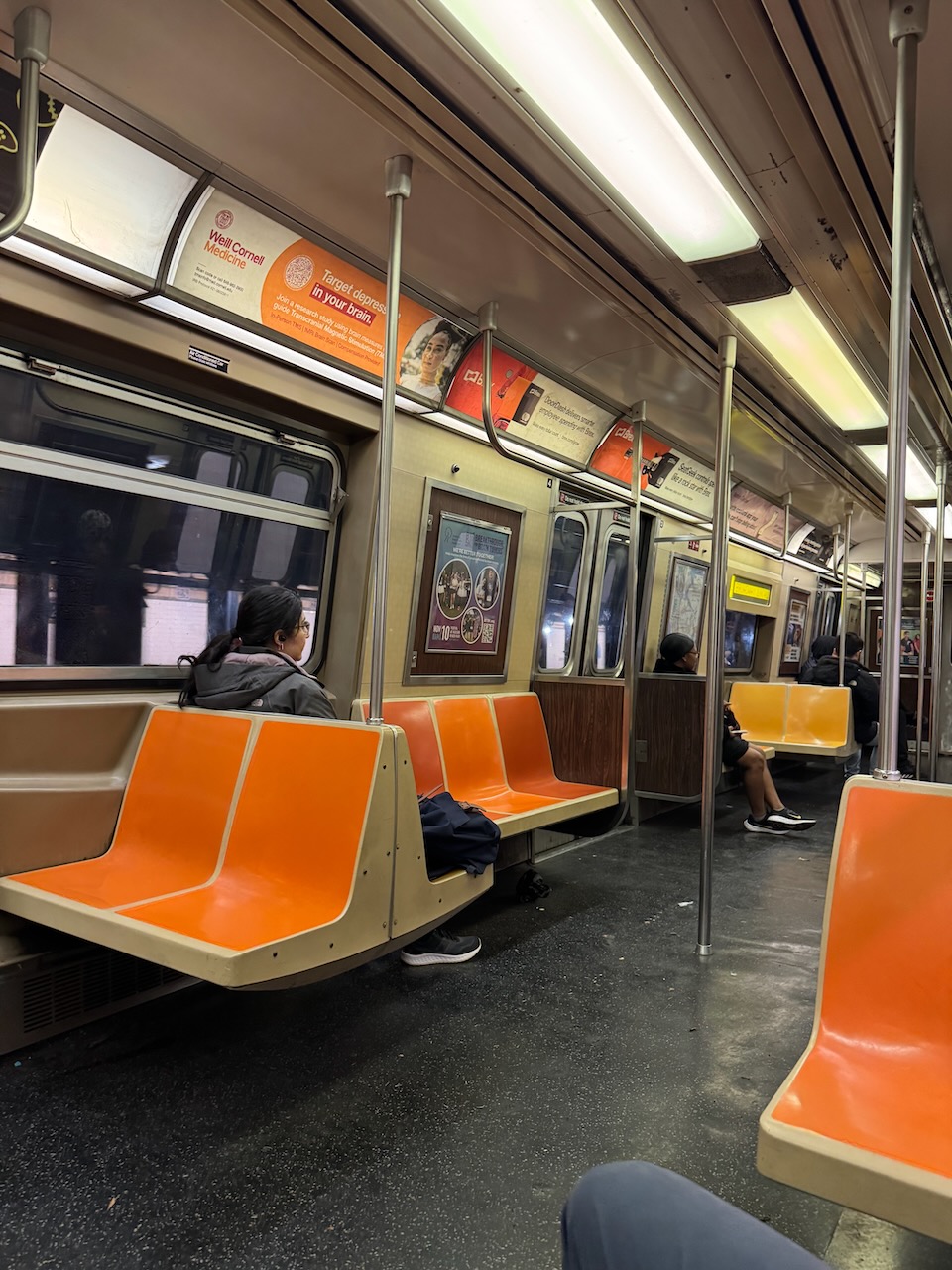Inside a subway train.