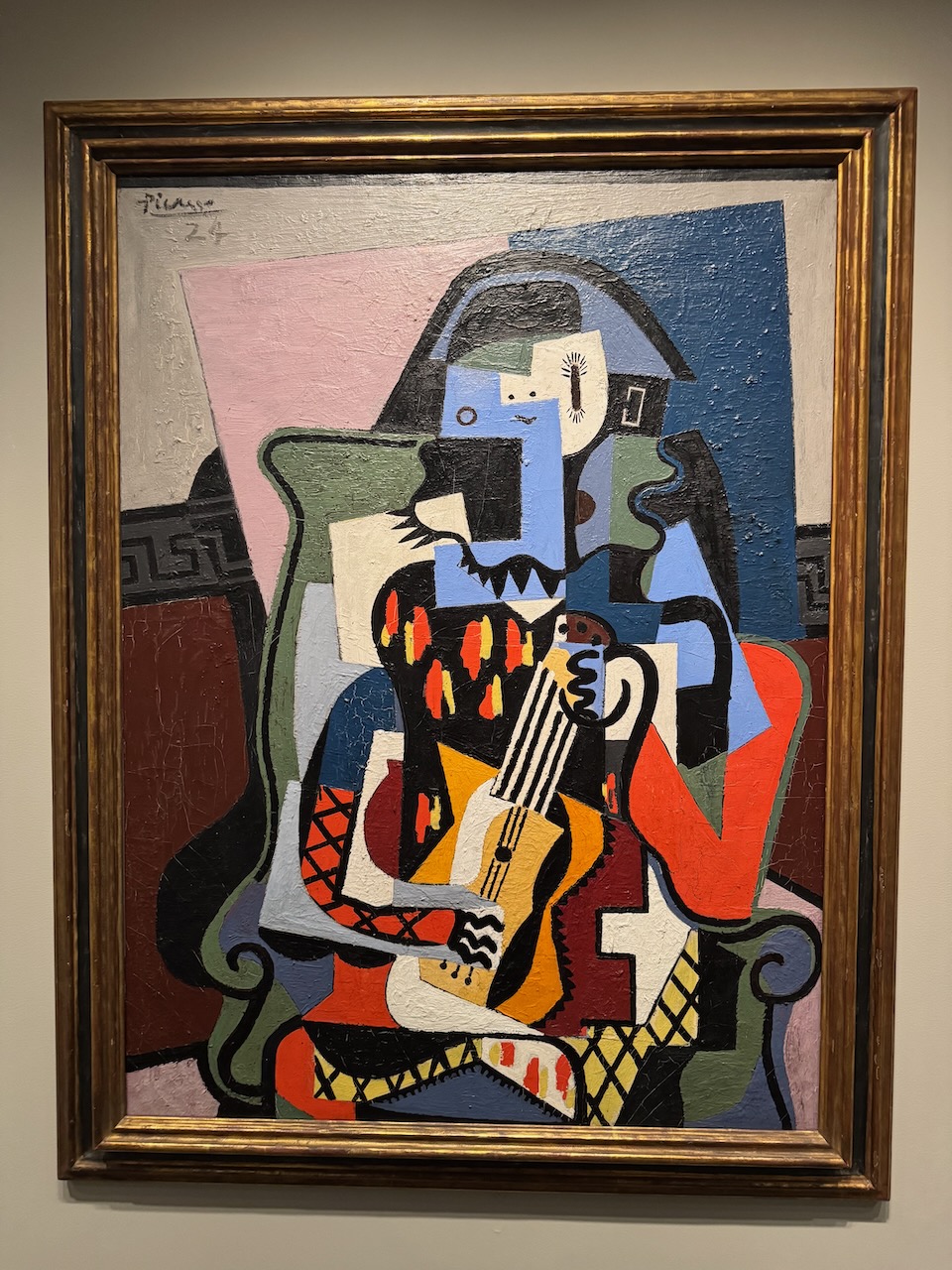 Harlequin Musician by Picasso